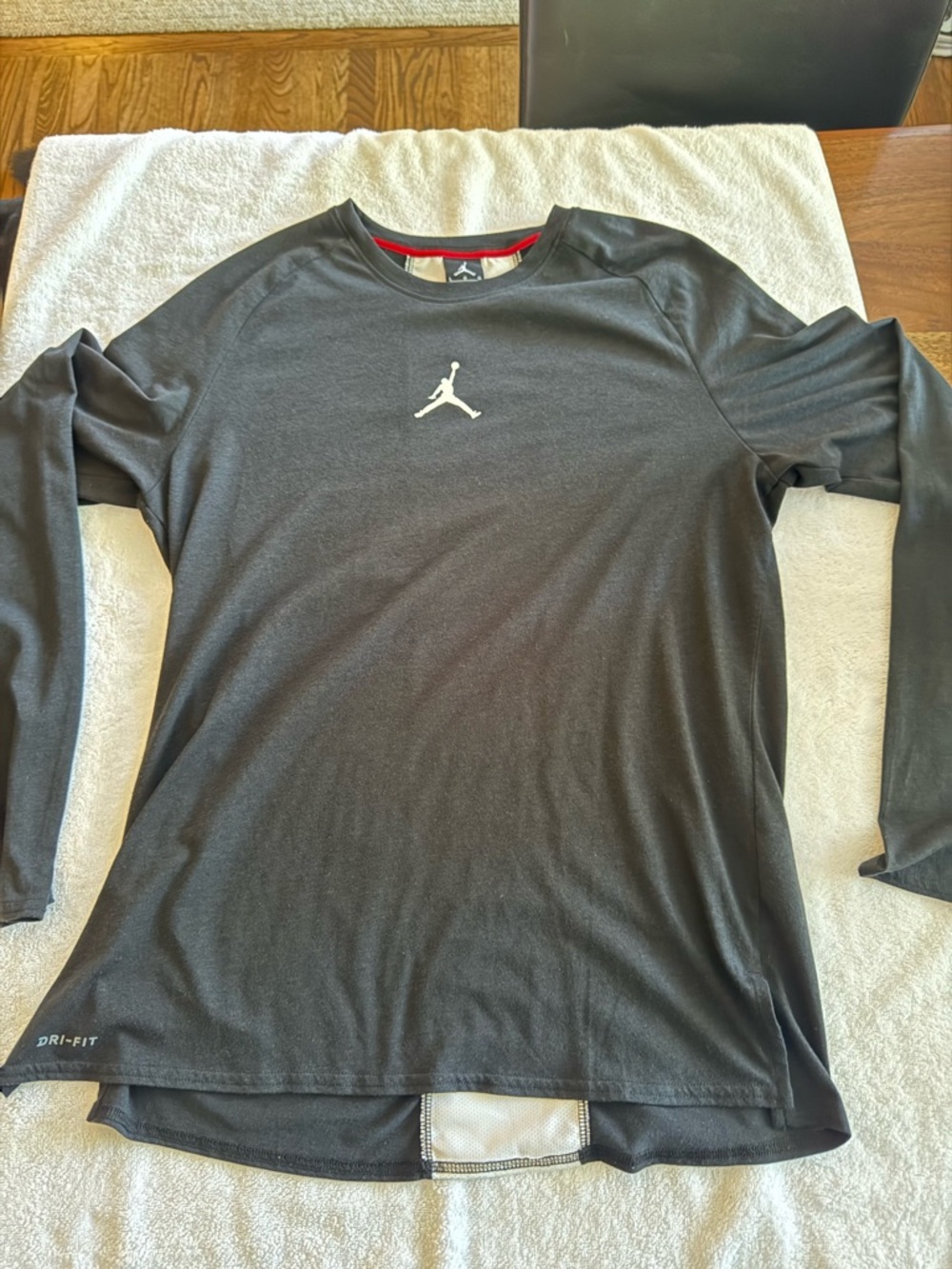Jordan Men's Black Long-Sleeve, Dri fit T-shirt. Very good condition.